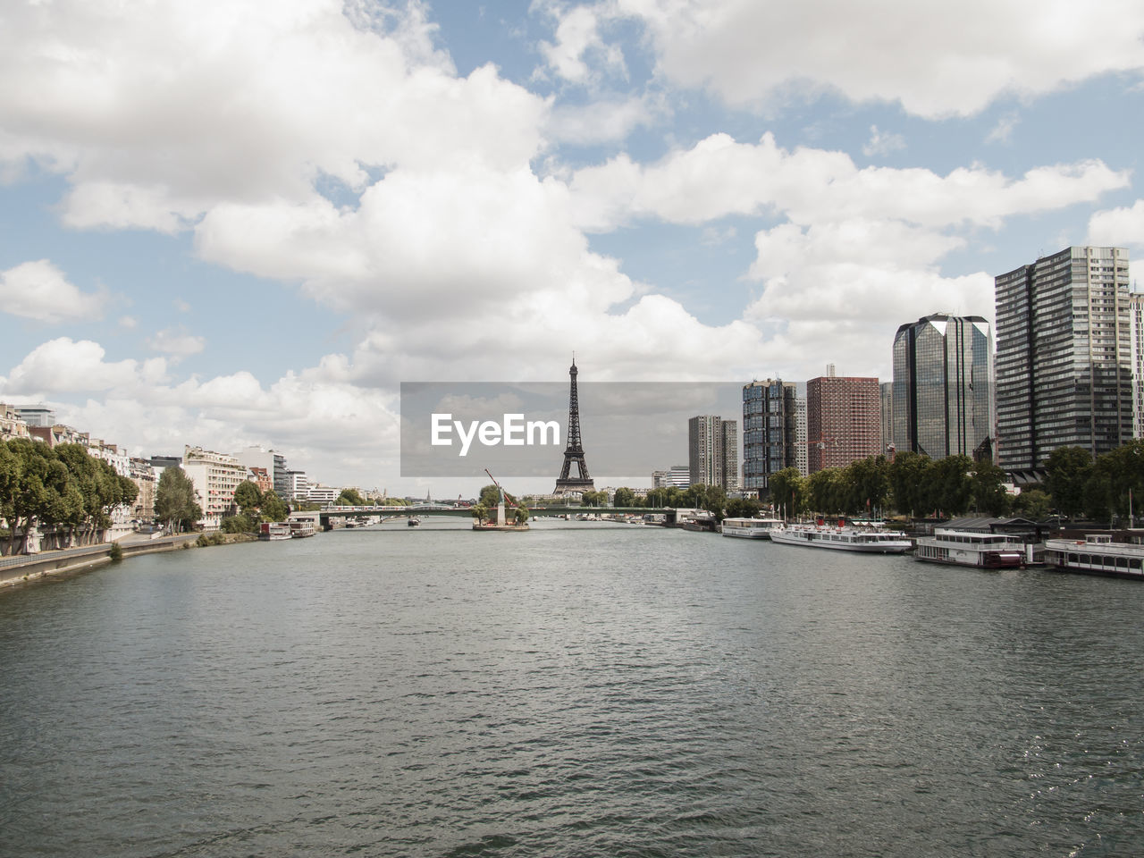 RIVER WITH CITYSCAPE IN BACKGROUND