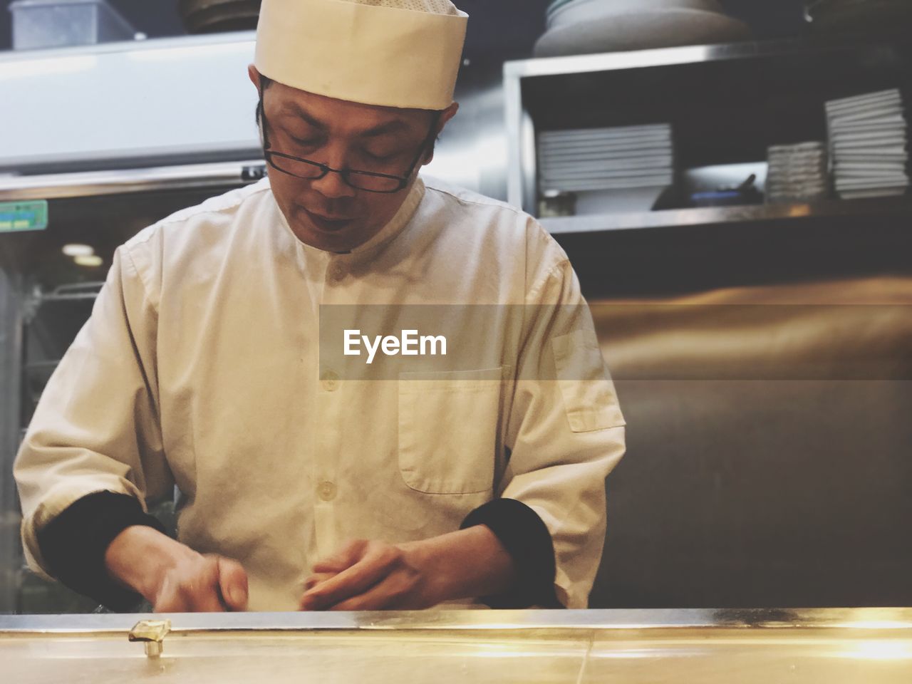 Chef working in kitchen