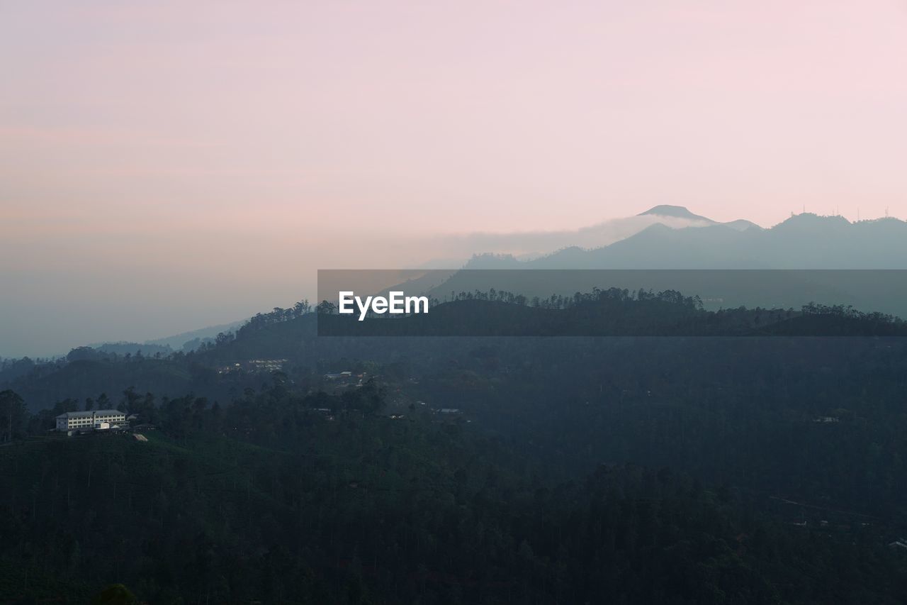 Scenic view of mountains during foggy weather