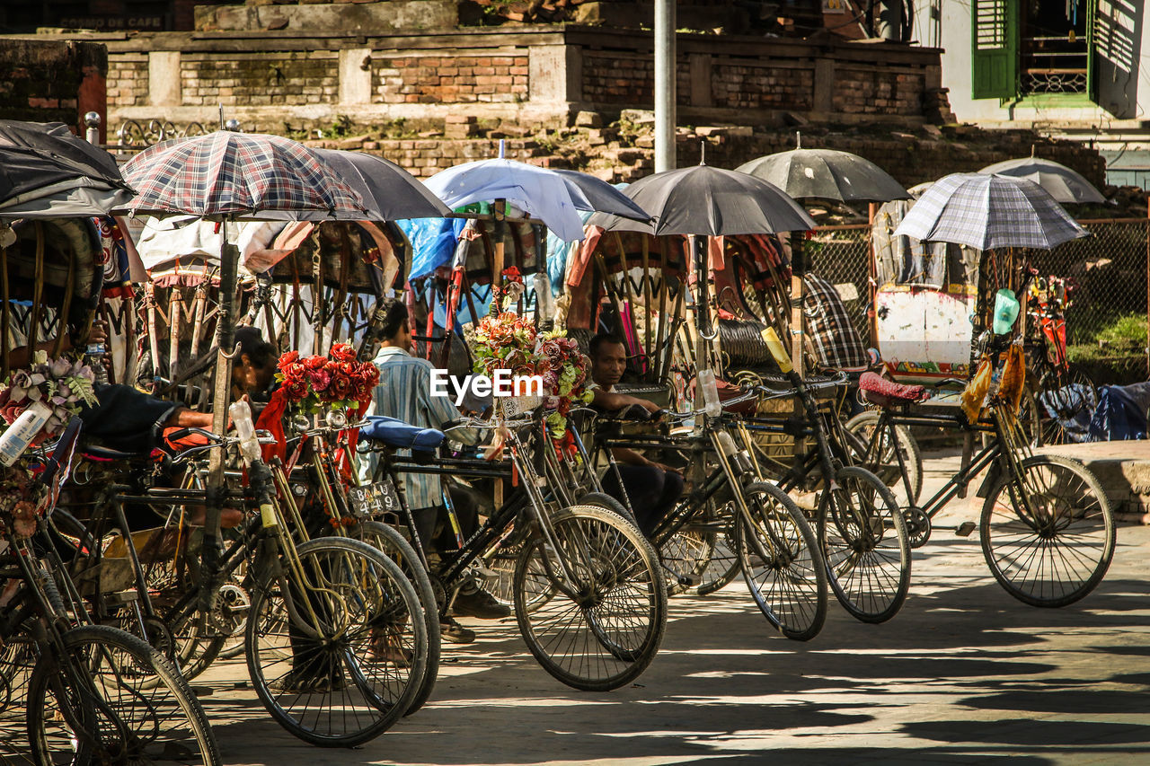 BICYCLES ON STREET IN RAIN