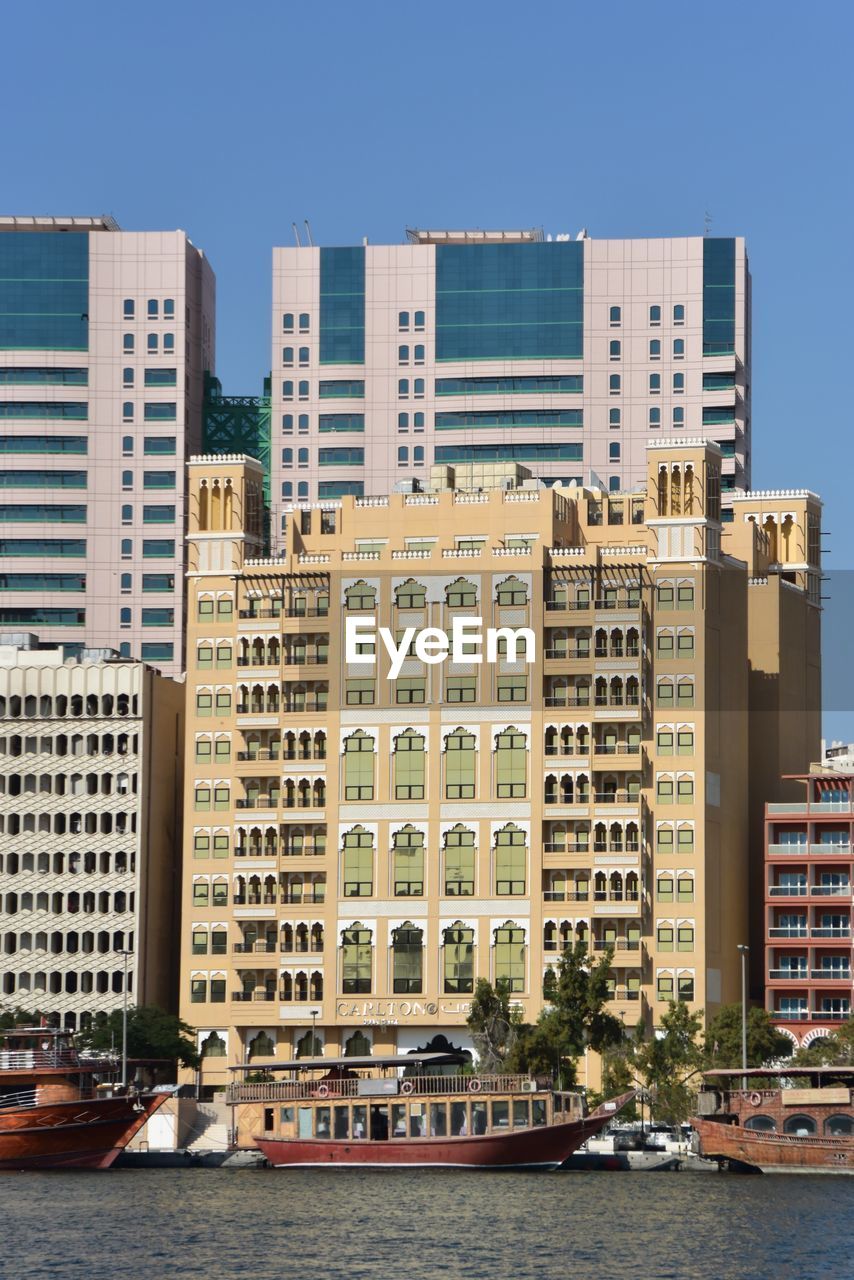 VIEW OF BUILDINGS AT WATERFRONT