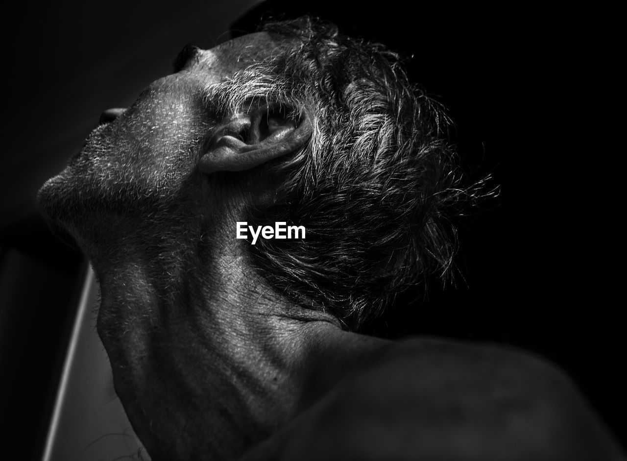 Close-up of man looking away