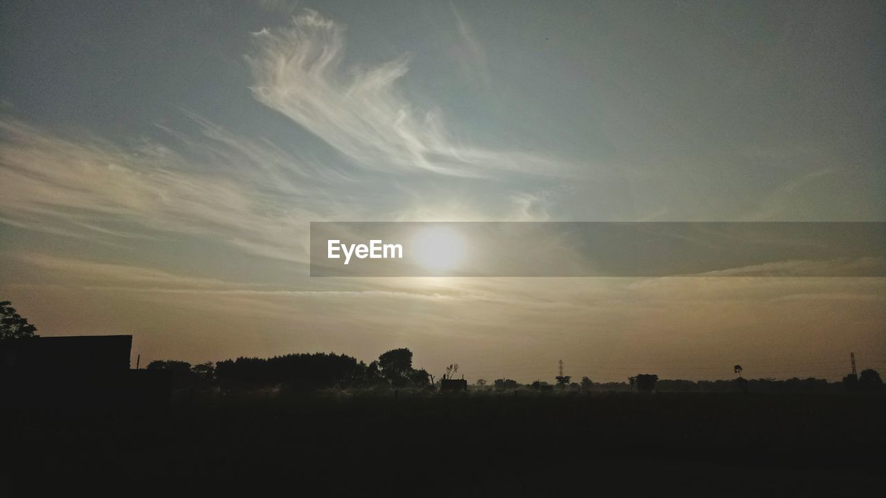 SILHOUETTE LANDSCAPE AGAINST SKY DURING SUNSET