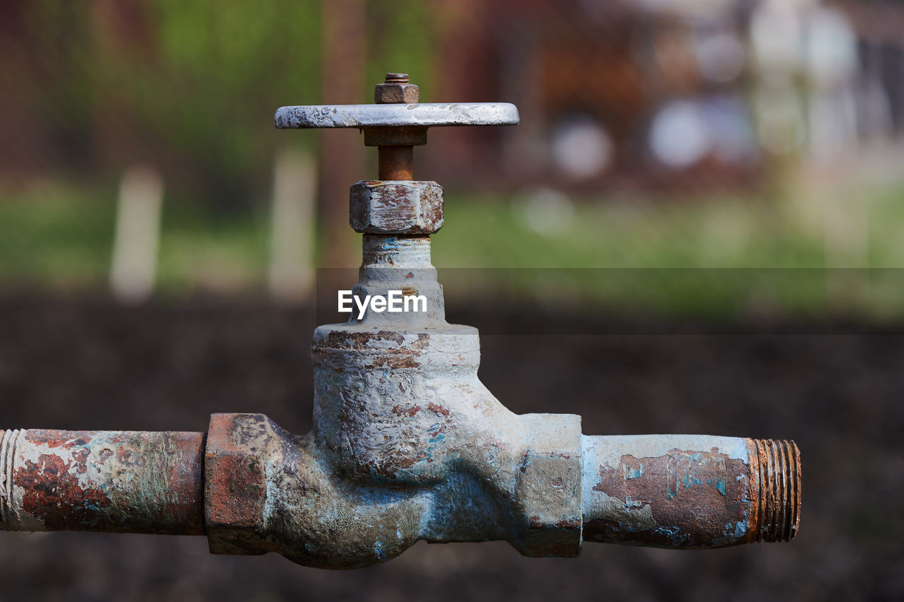 Close-up of fire hydrant on field