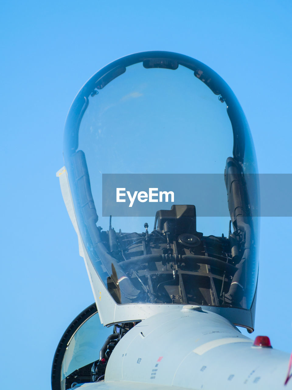 LOW ANGLE VIEW OF AIRPLANE AGAINST CLEAR SKY