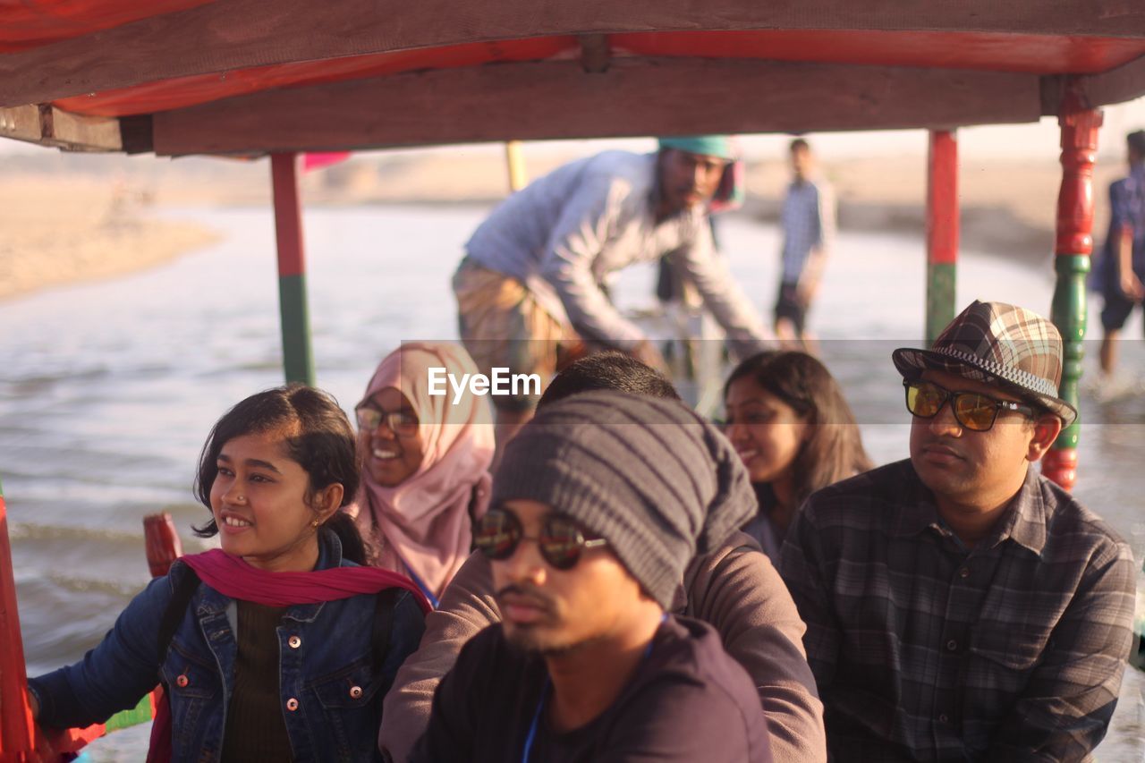 A candid of a group of people who were travelling by boat