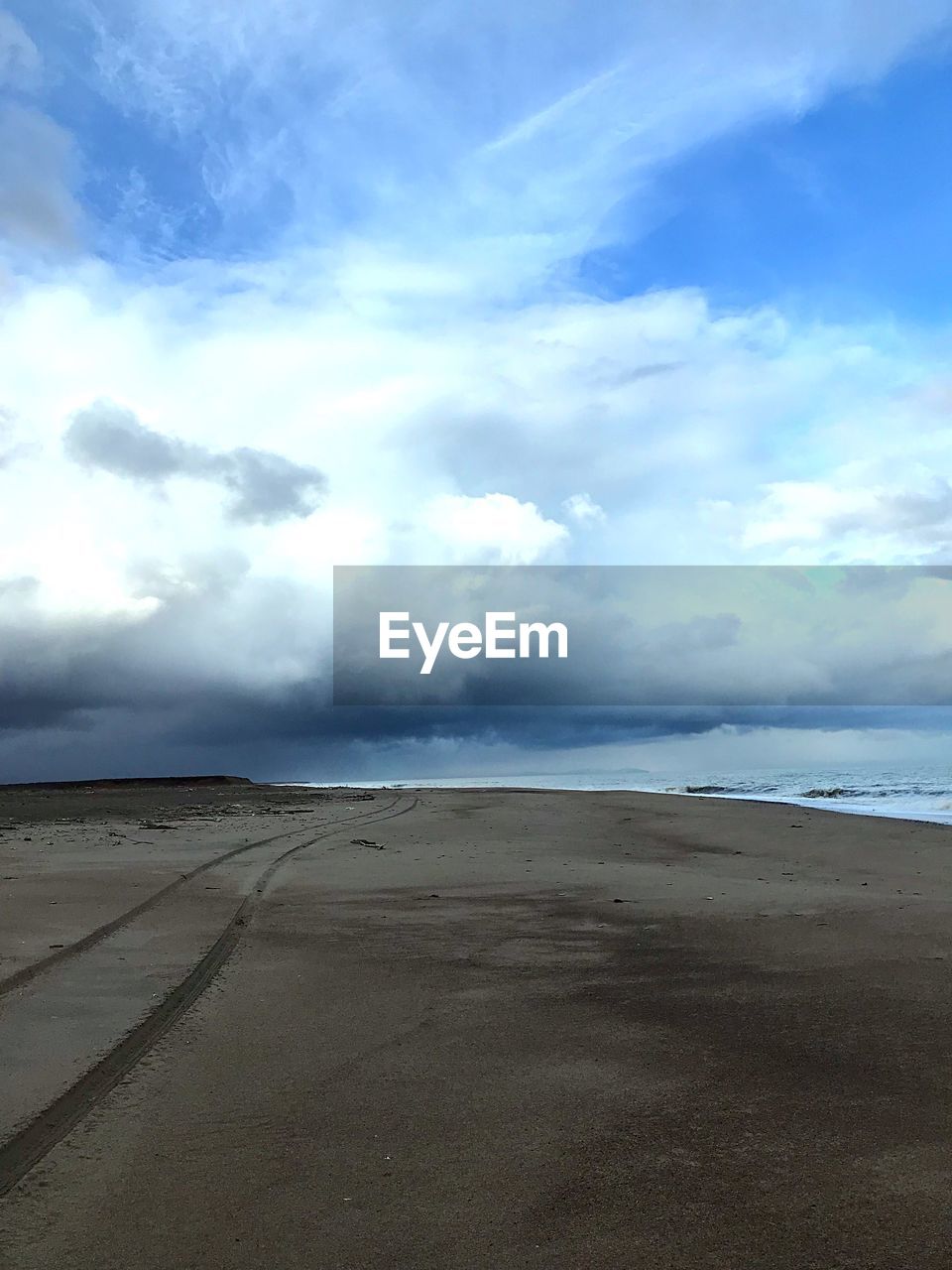 VIEW OF BEACH AGAINST SKY