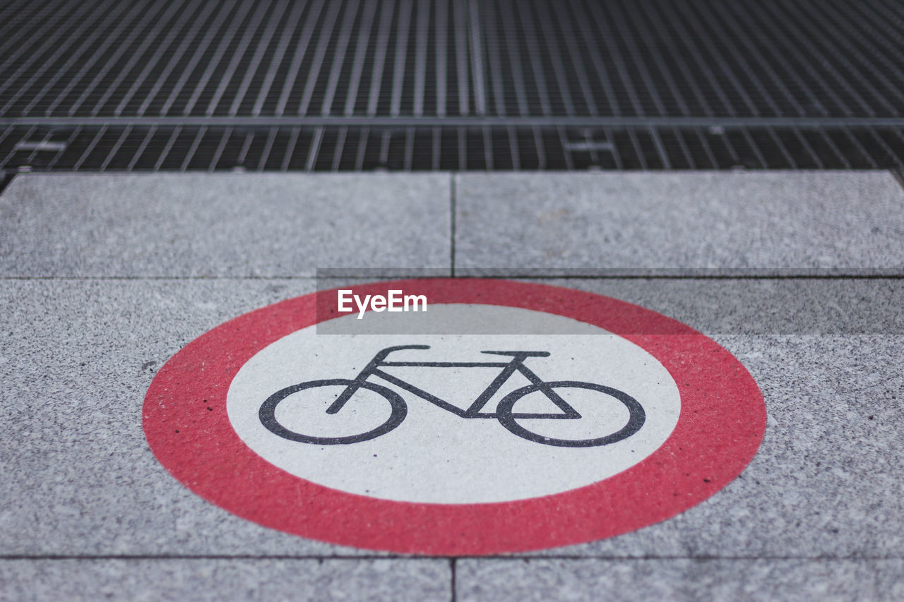 High angle view of bicycle sign on road