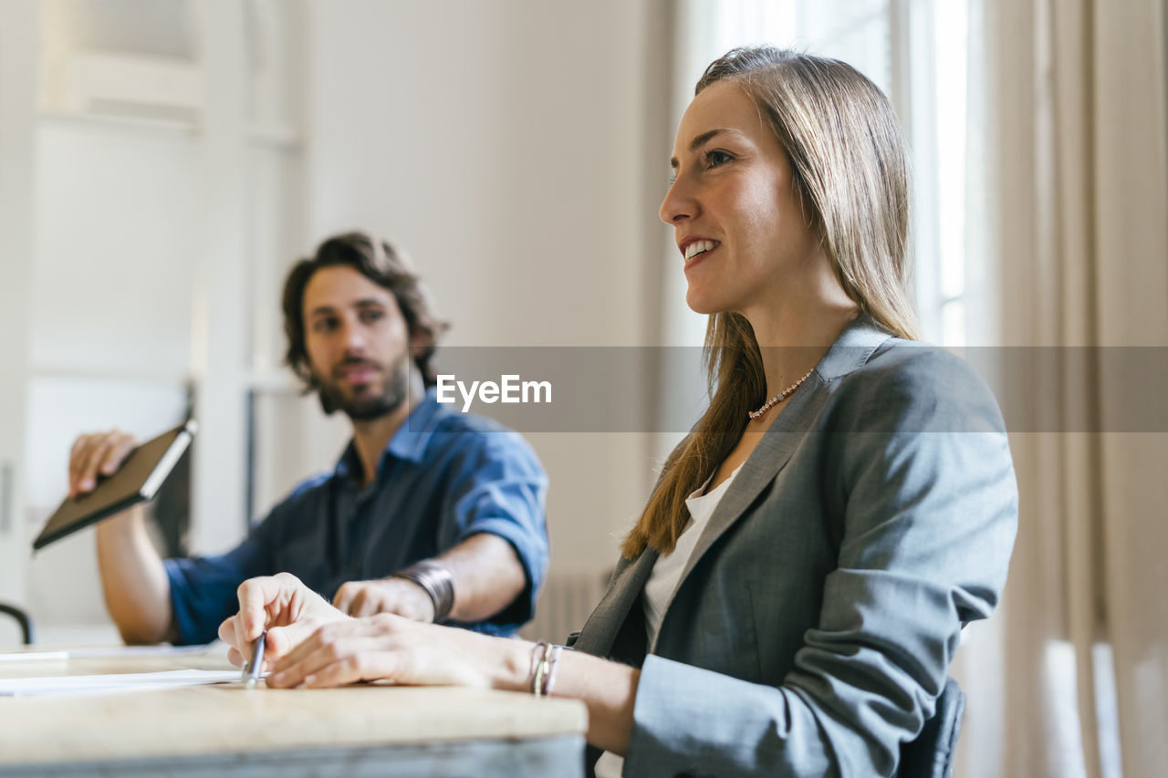 Businesspeople working together in office