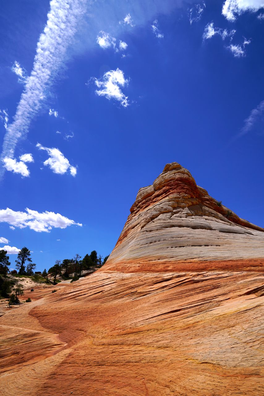 Low angle view of rock formations against sky