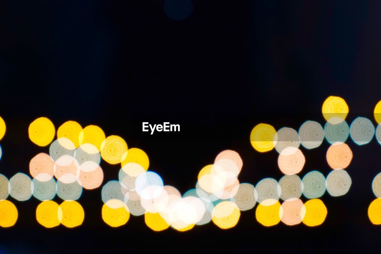 DEFOCUSED IMAGE OF CHRISTMAS LIGHTS