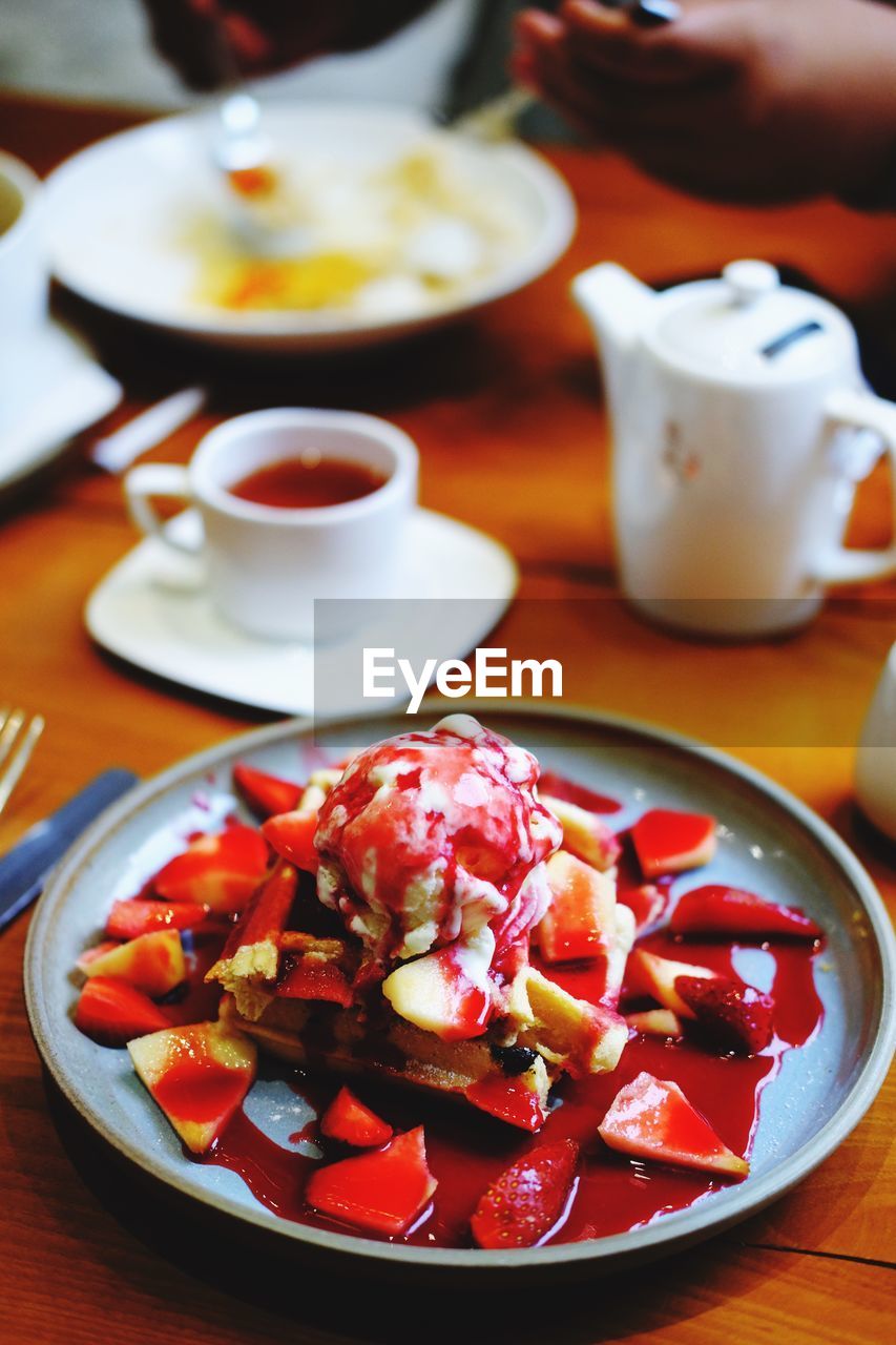 Close-up of food served on table