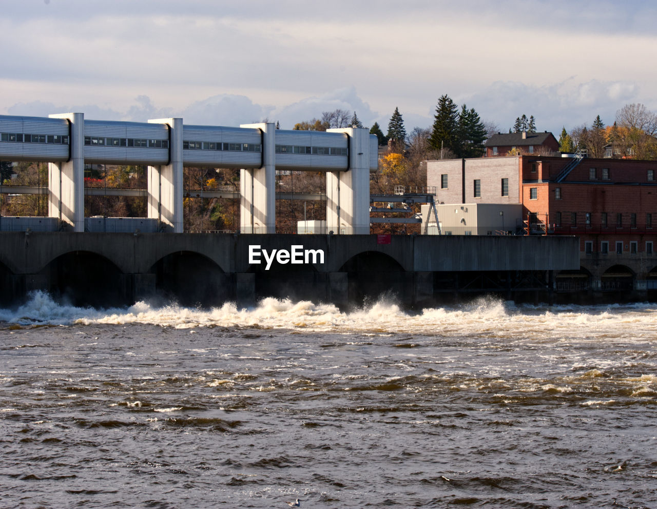 water, architecture, transport, sea, built structure, nature, building exterior, vehicle, sky, coast, transportation, building, cloud, motion, no people, city, land, outdoors, environment, waterway, shore, wave, beach, day, ocean