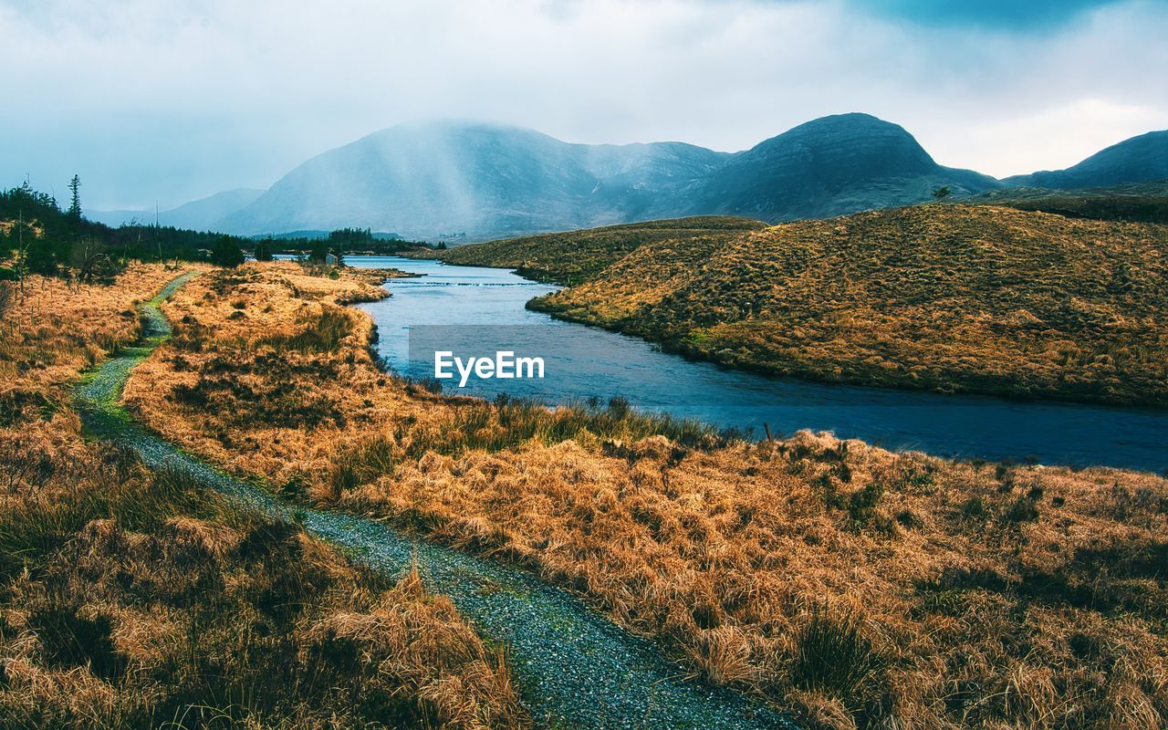 Dramatic cloudy landscape scenery  at derryclare natural reserve, connemara, galway, ireland