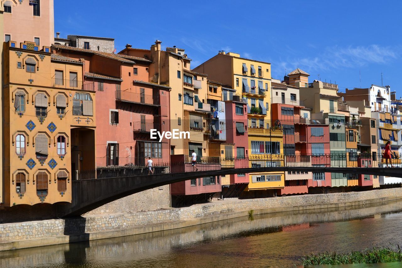 View of bridge over river in city