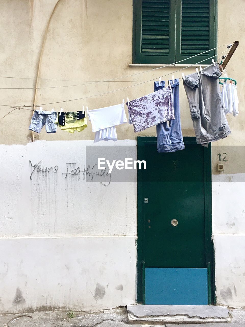 Clothes drying against building