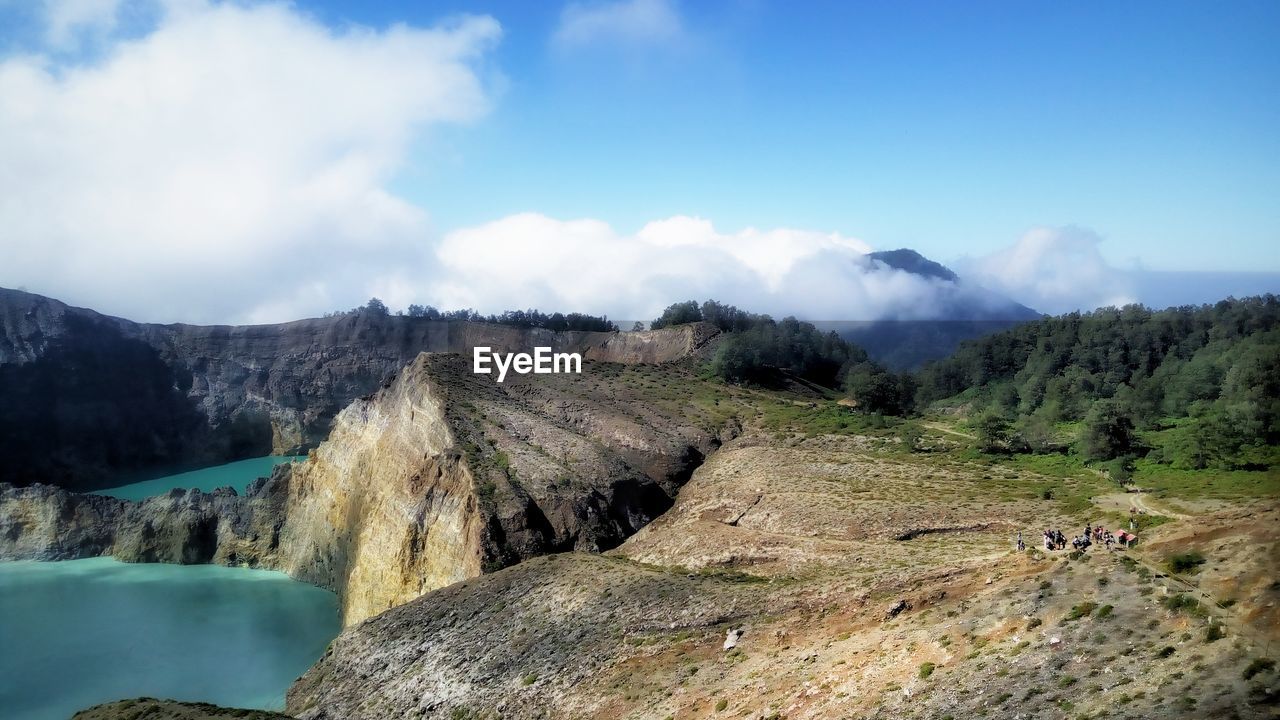 Panoramic view of landscape against cloudy sky