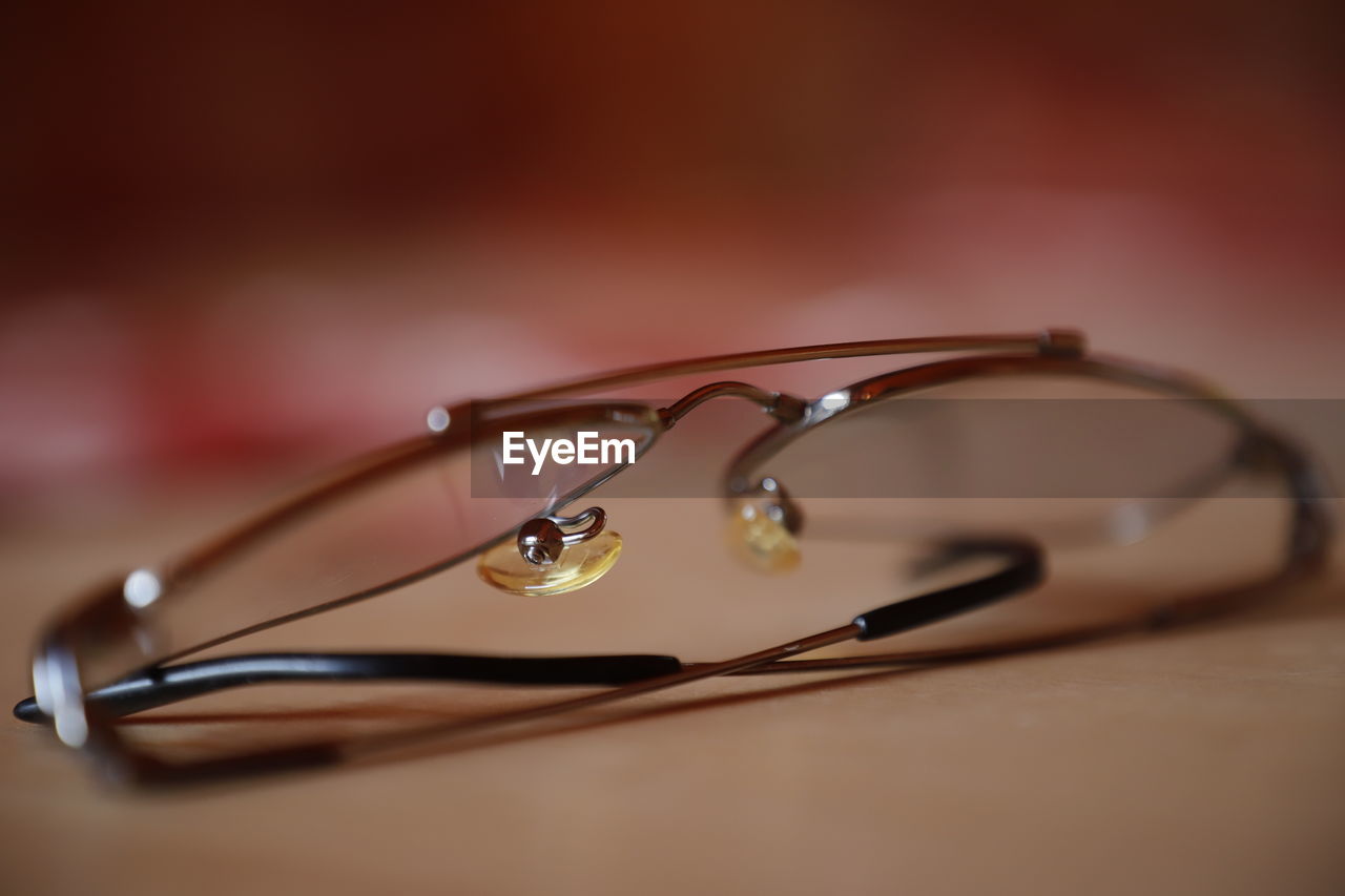 Close-0up of eyeglasses on table