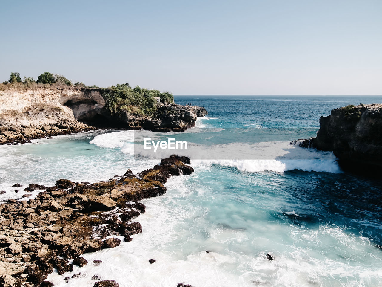 Scenic view of sea against clear sky