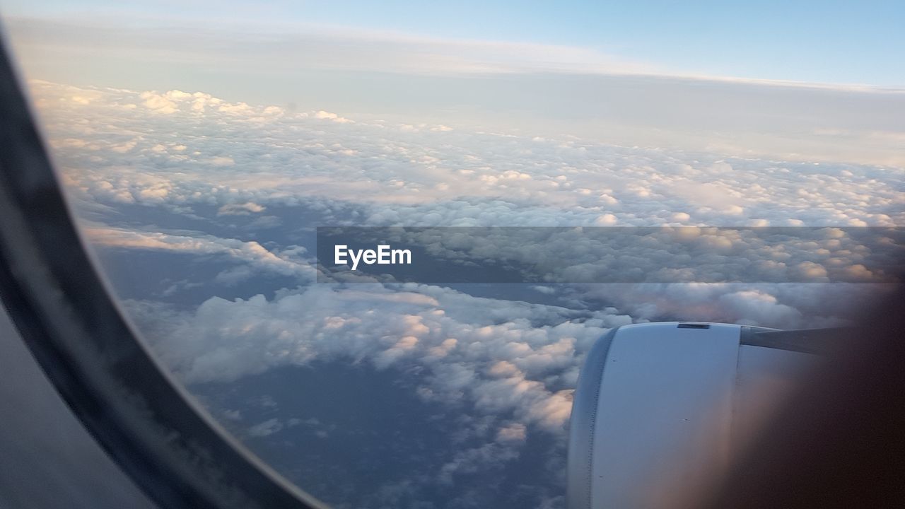 AERIAL VIEW OF CLOUDS SEEN FROM AIRPLANE