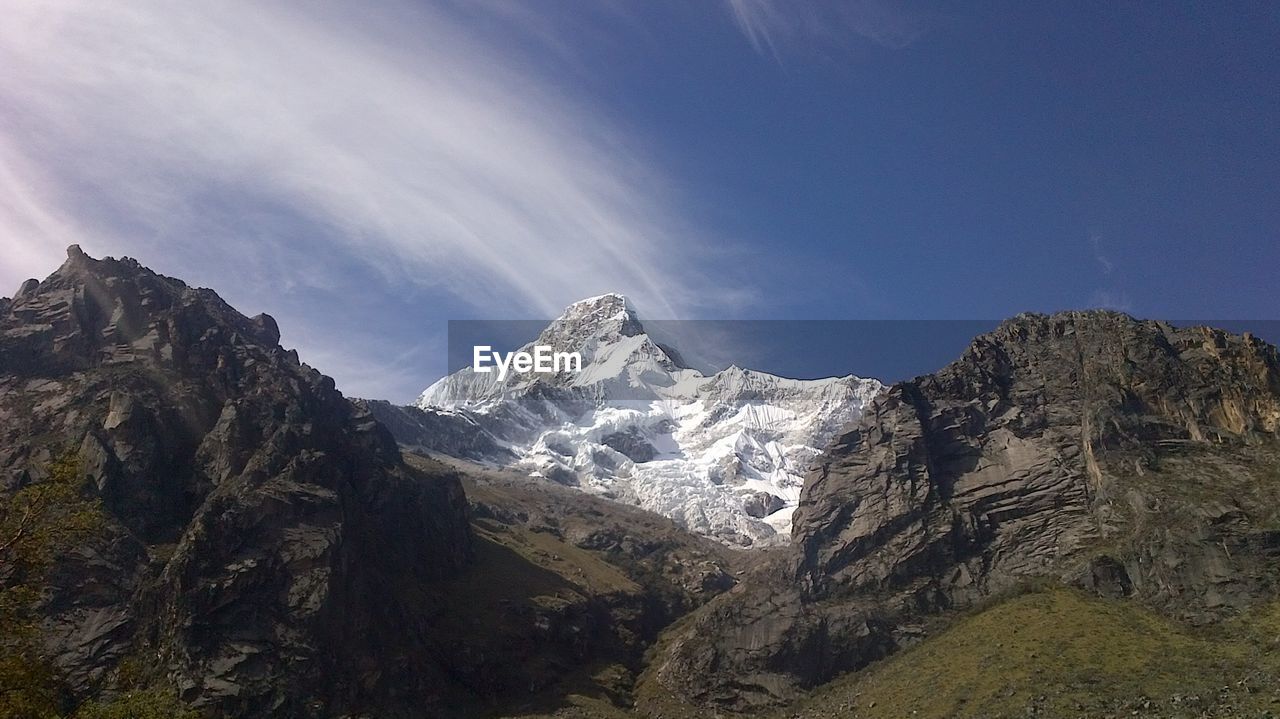 SCENIC VIEW OF ROCKY MOUNTAINS AGAINST SKY