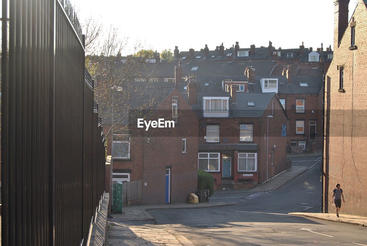 STREET AMIDST BUILDINGS IN CITY