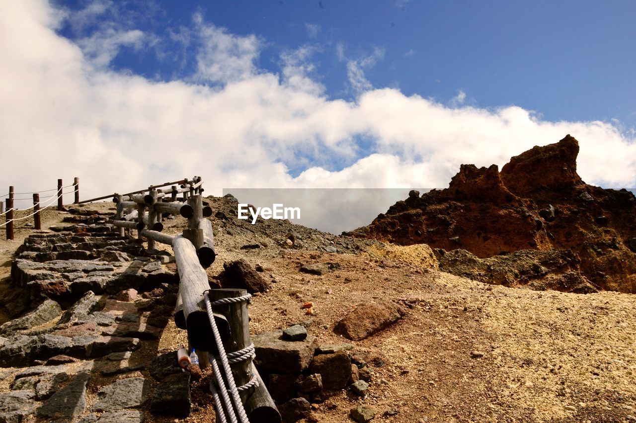 LOW ANGLE VIEW OF ROCKS AGAINST SKY