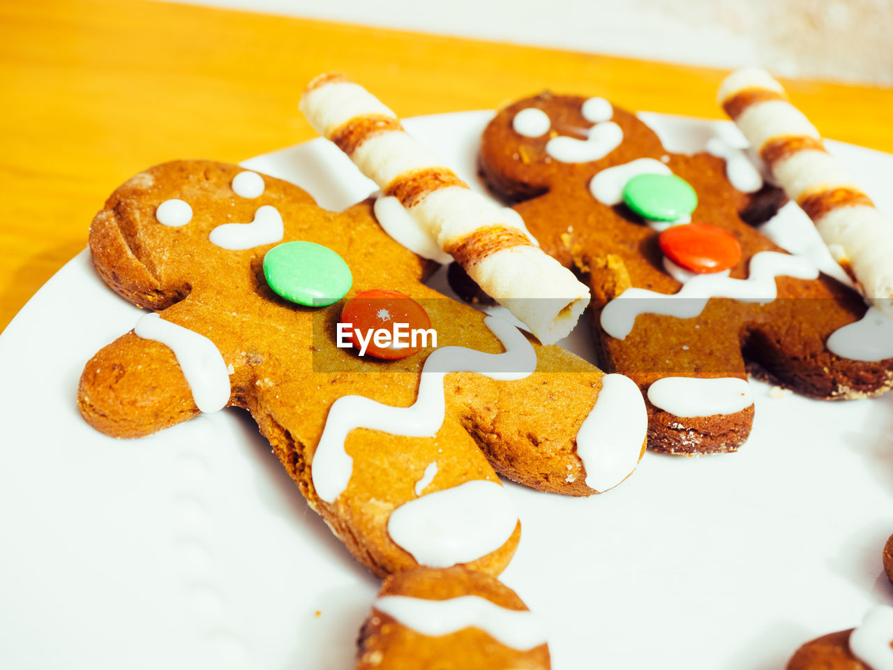 Close-up of gingerbread men on table