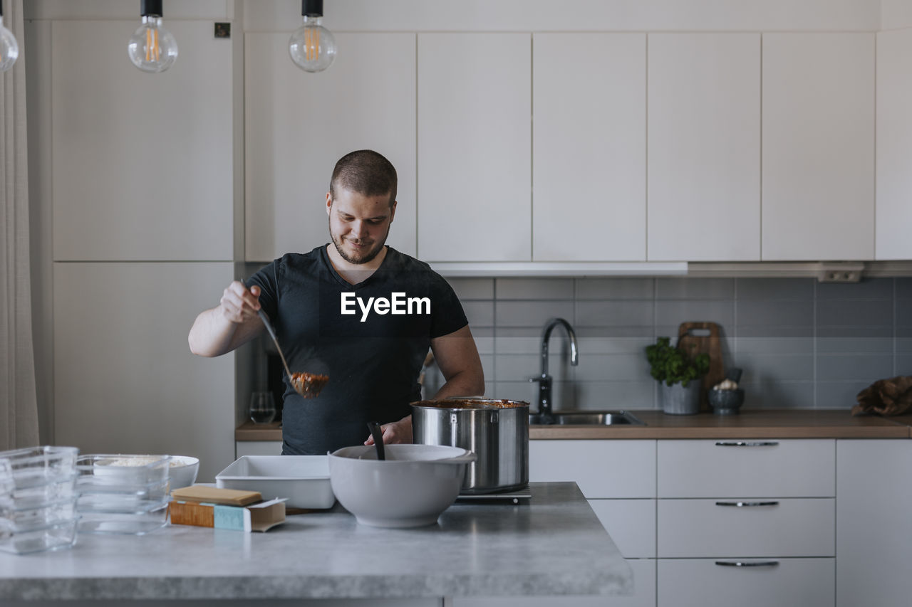 Man doing meal prep at home