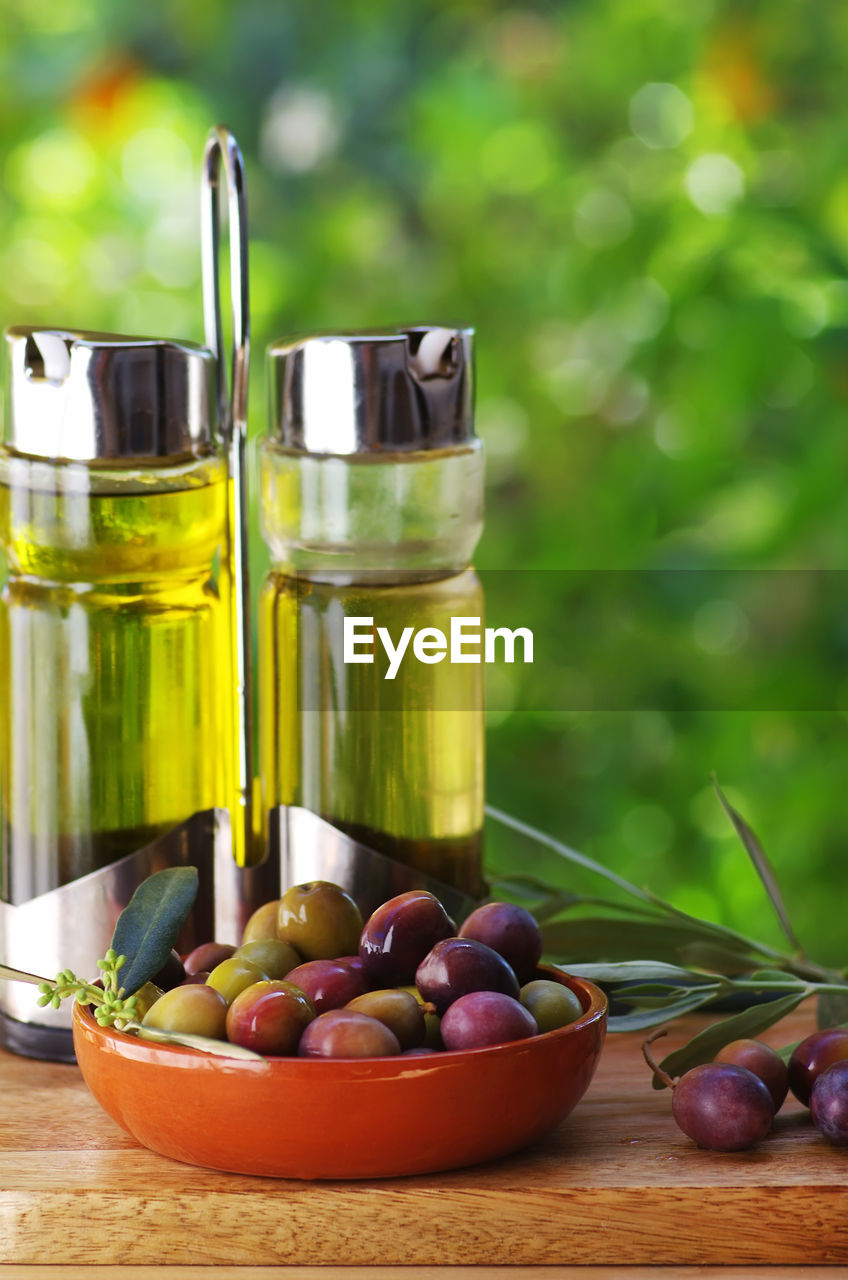 Close-up of olives in bowl on table