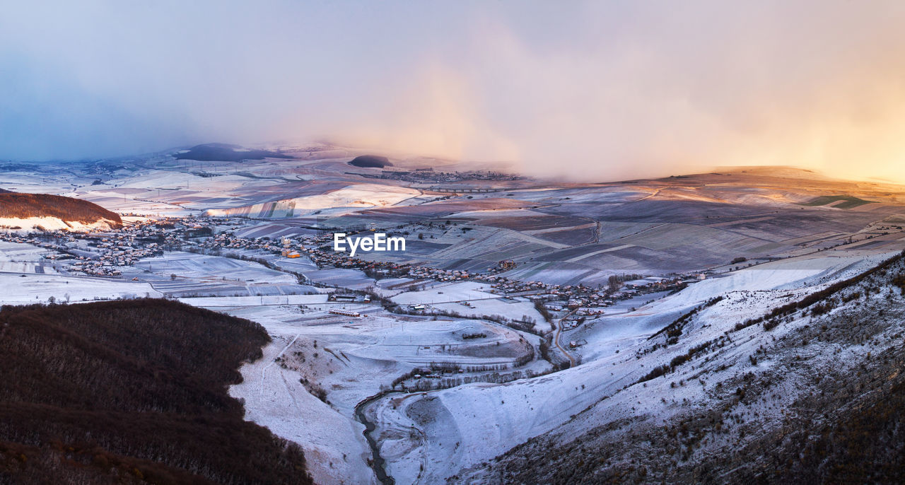 Scenic view of snow covered village