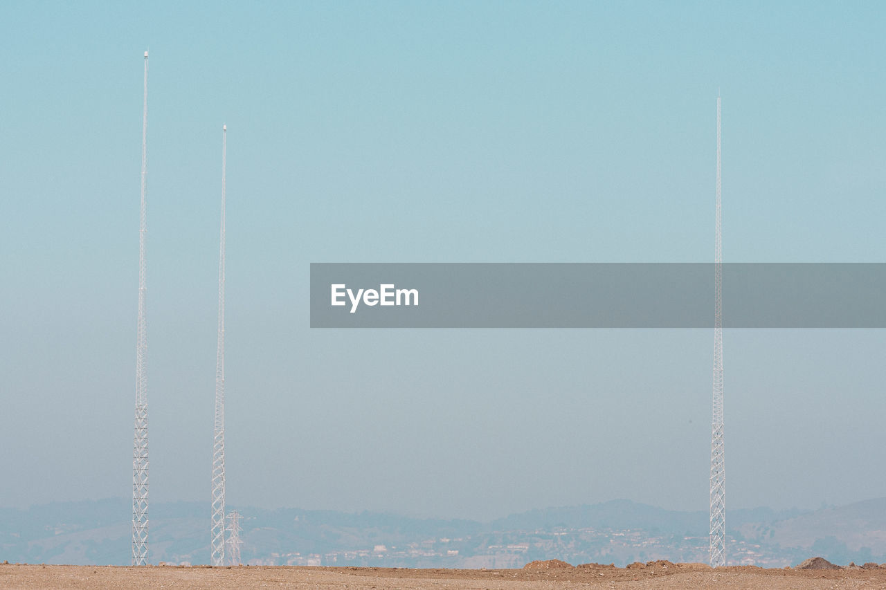 LOW ANGLE VIEW OF VAPOR TRAILS IN SKY