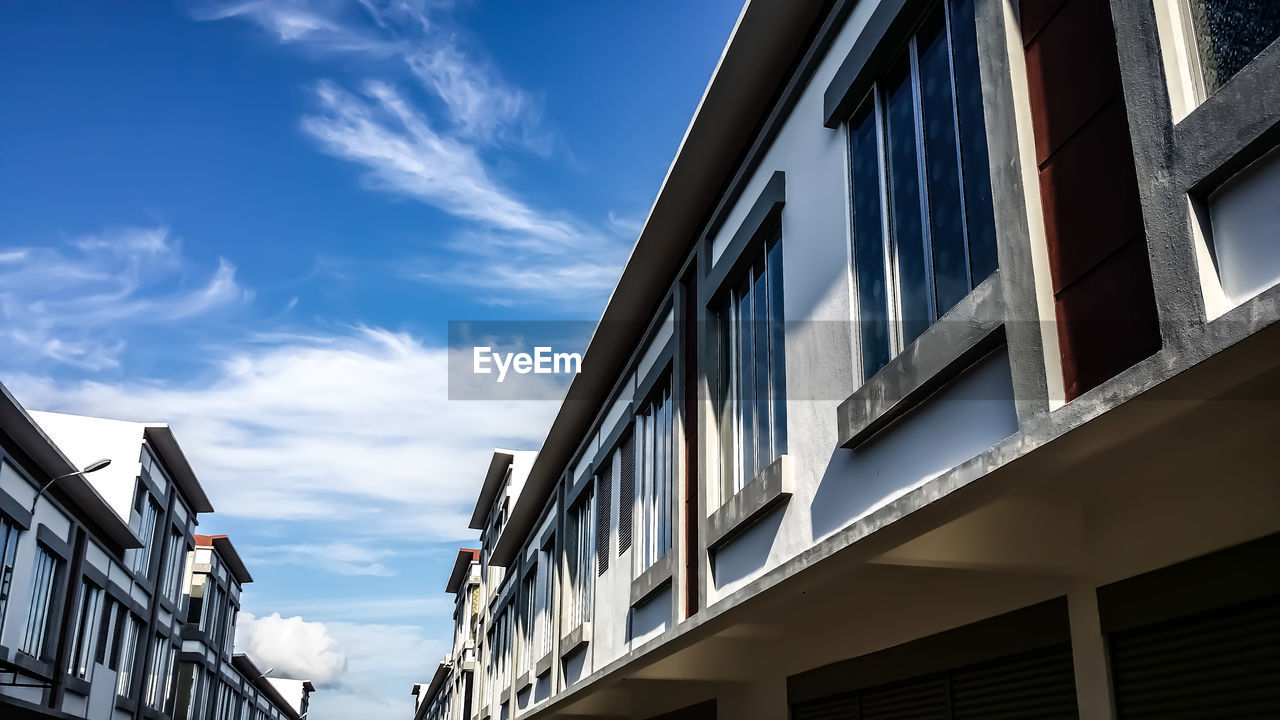 Low angle view of buildings against sky