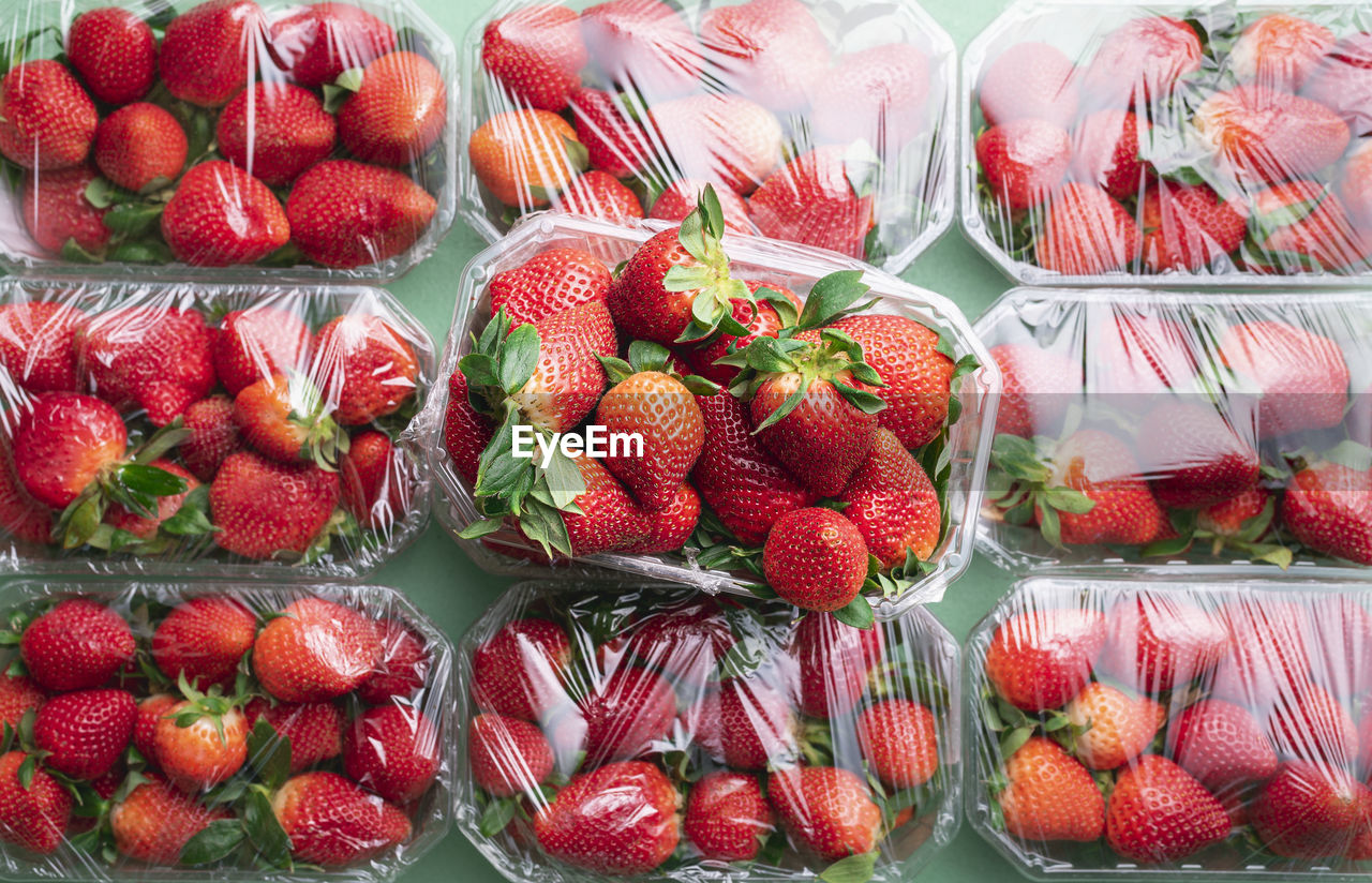CLOSE-UP OF STRAWBERRIES IN MARKET