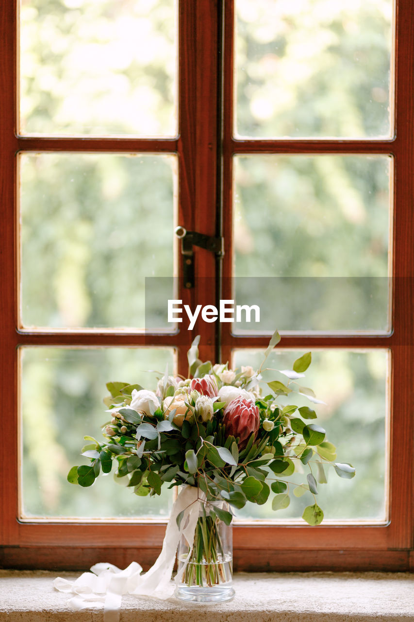 FLOWERS ON WINDOW SILL