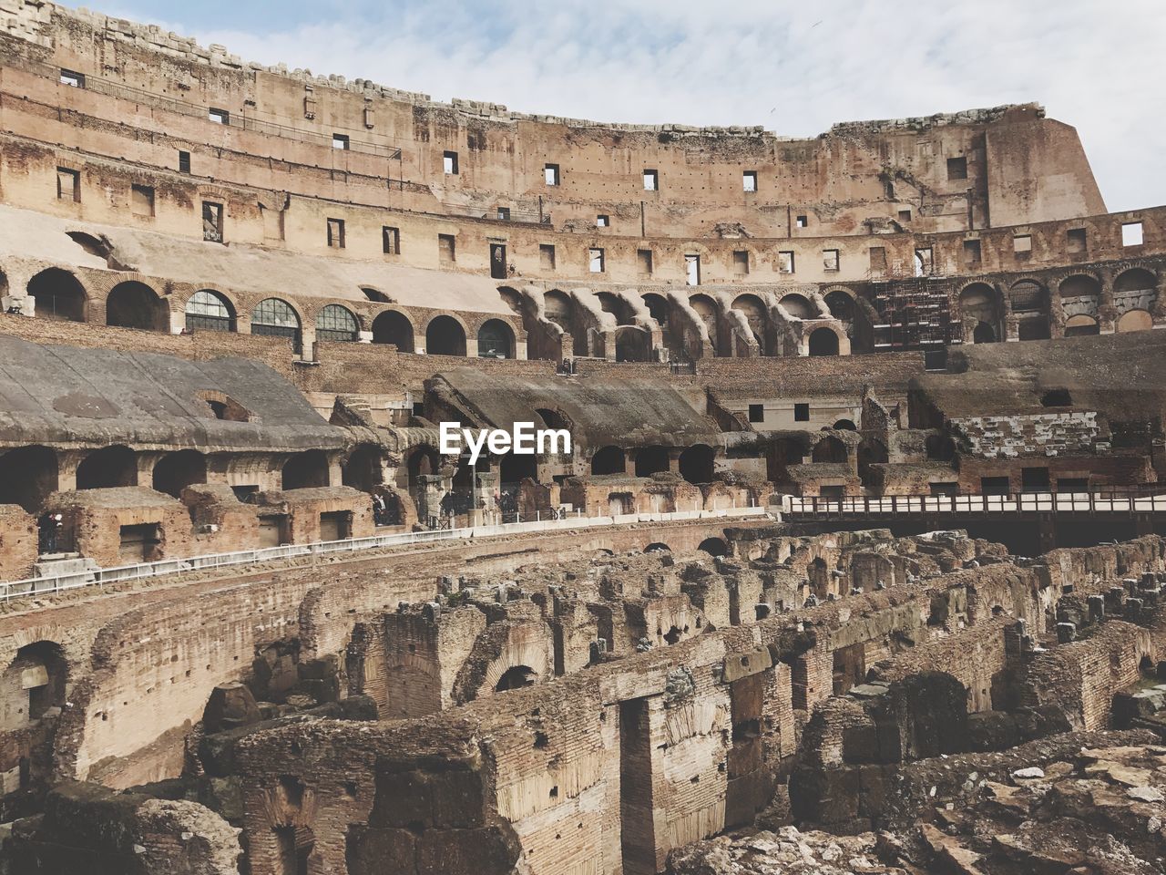 Low angle view of coliseum against sky