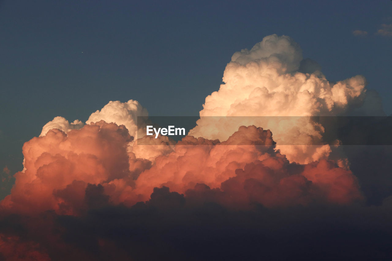 Low angle view of cloudscape against sky during sunset