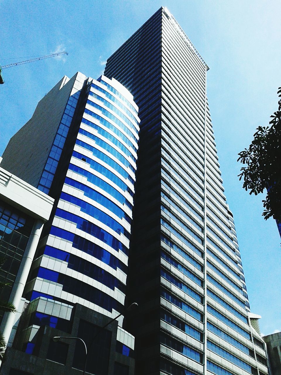 LOW ANGLE VIEW OF MODERN BUILDINGS