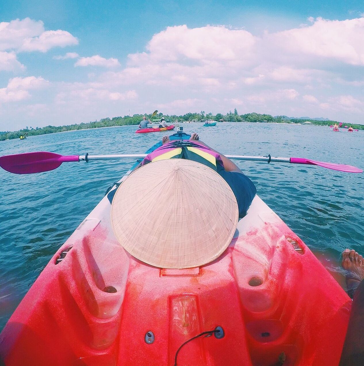 REAR VIEW OF BOAT IN SEA AGAINST SKY