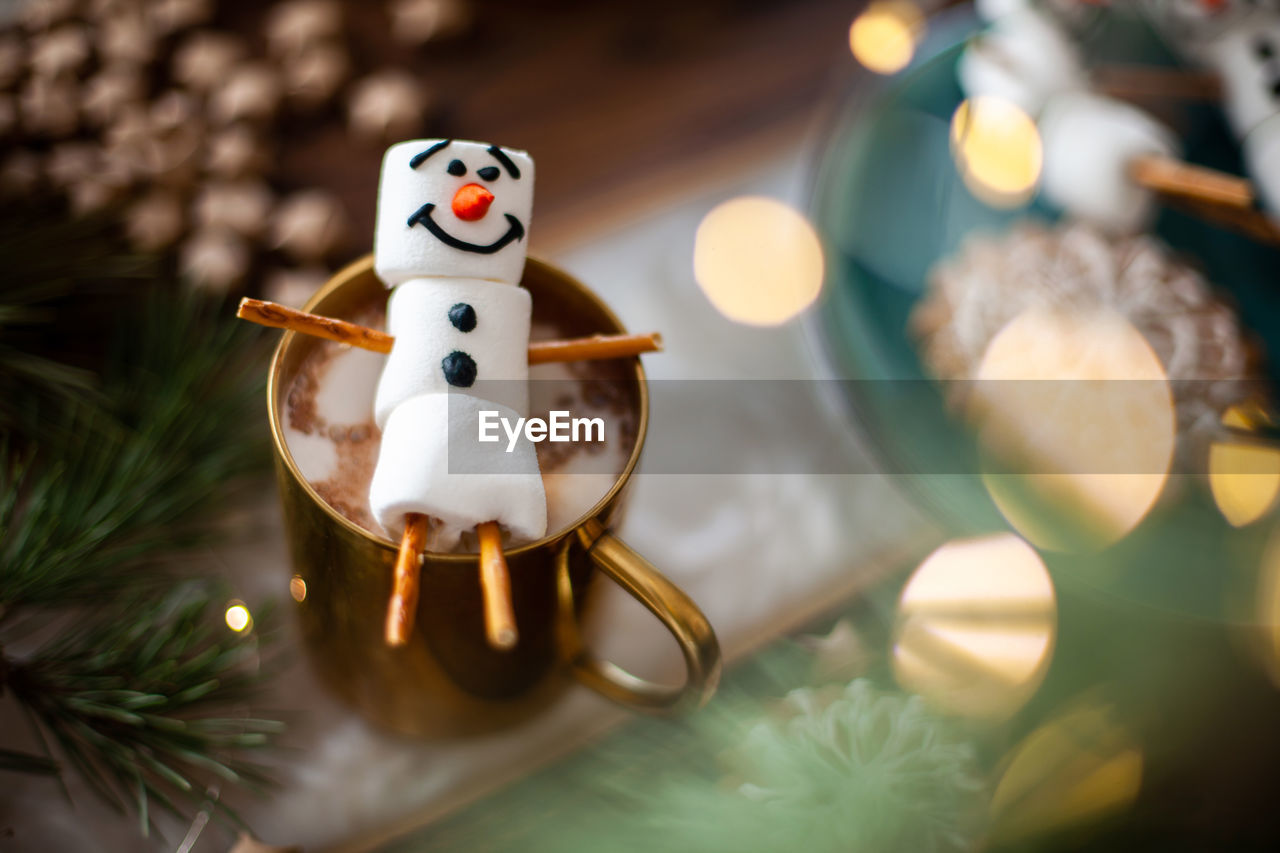 Close-up of marshmallow on hot chocolate cup