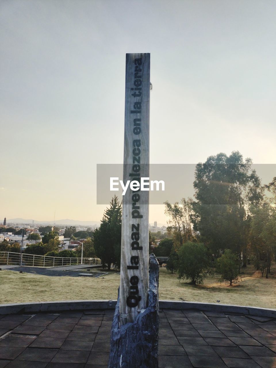 sky, landmark, architecture, nature, monument, tree, plant, memorial, no people, built structure, tower, sculpture, outdoors, text, day, city, column