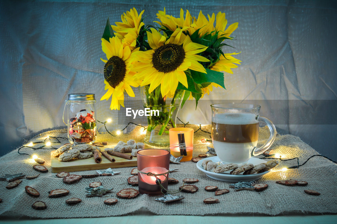 Close-up of sunflowers in vase on table
