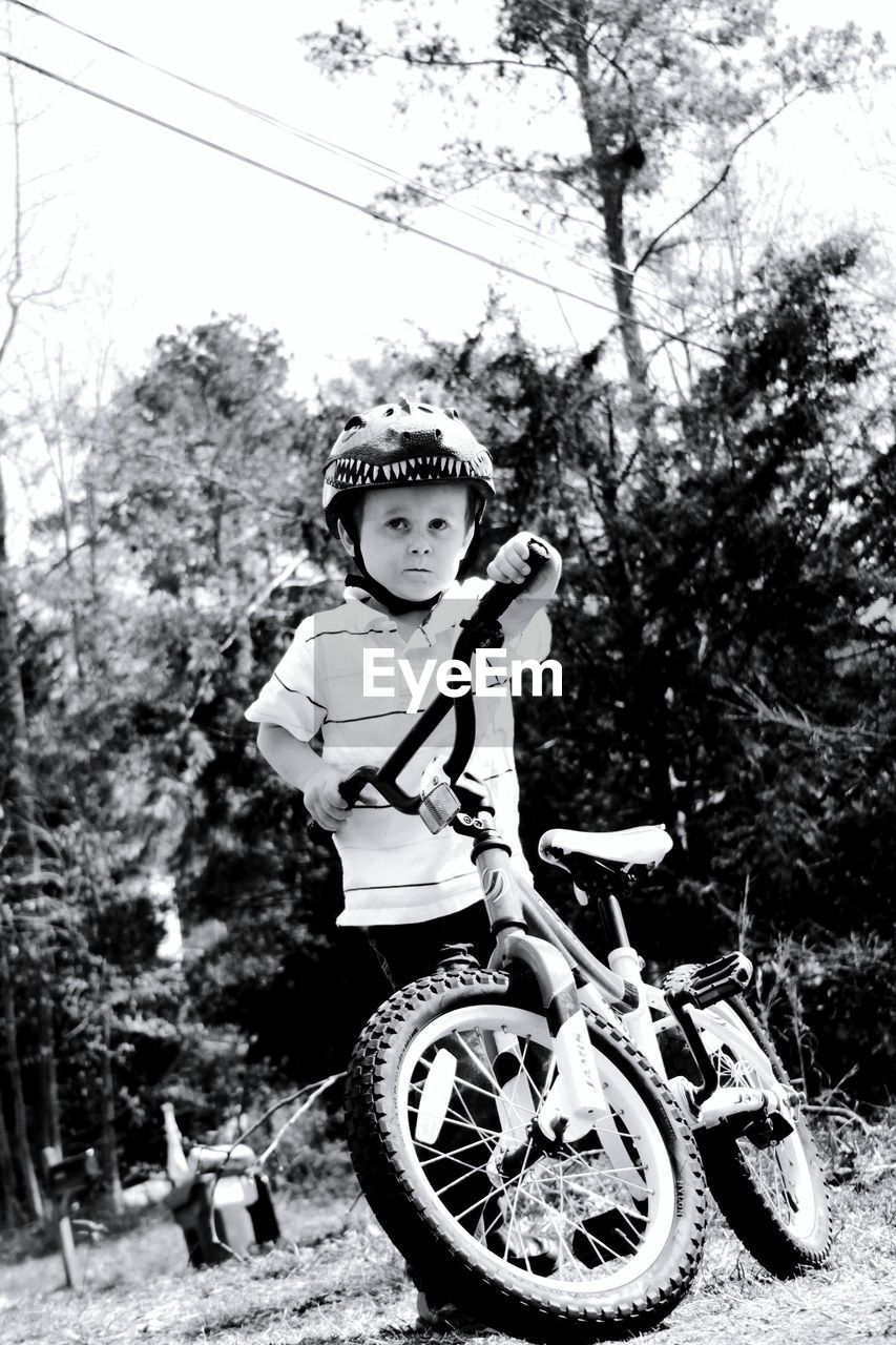 Boy with bicycle