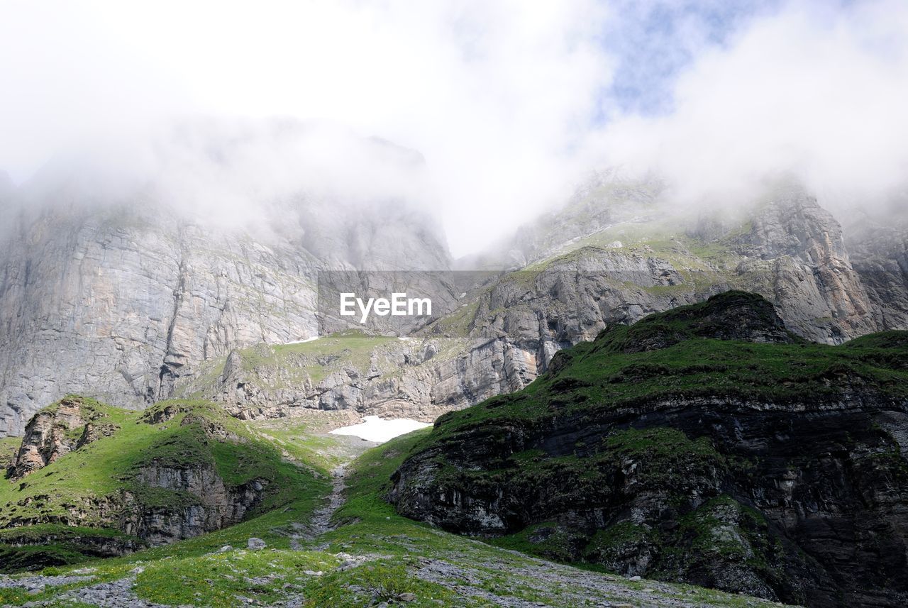 Scenic view of mountains against sky