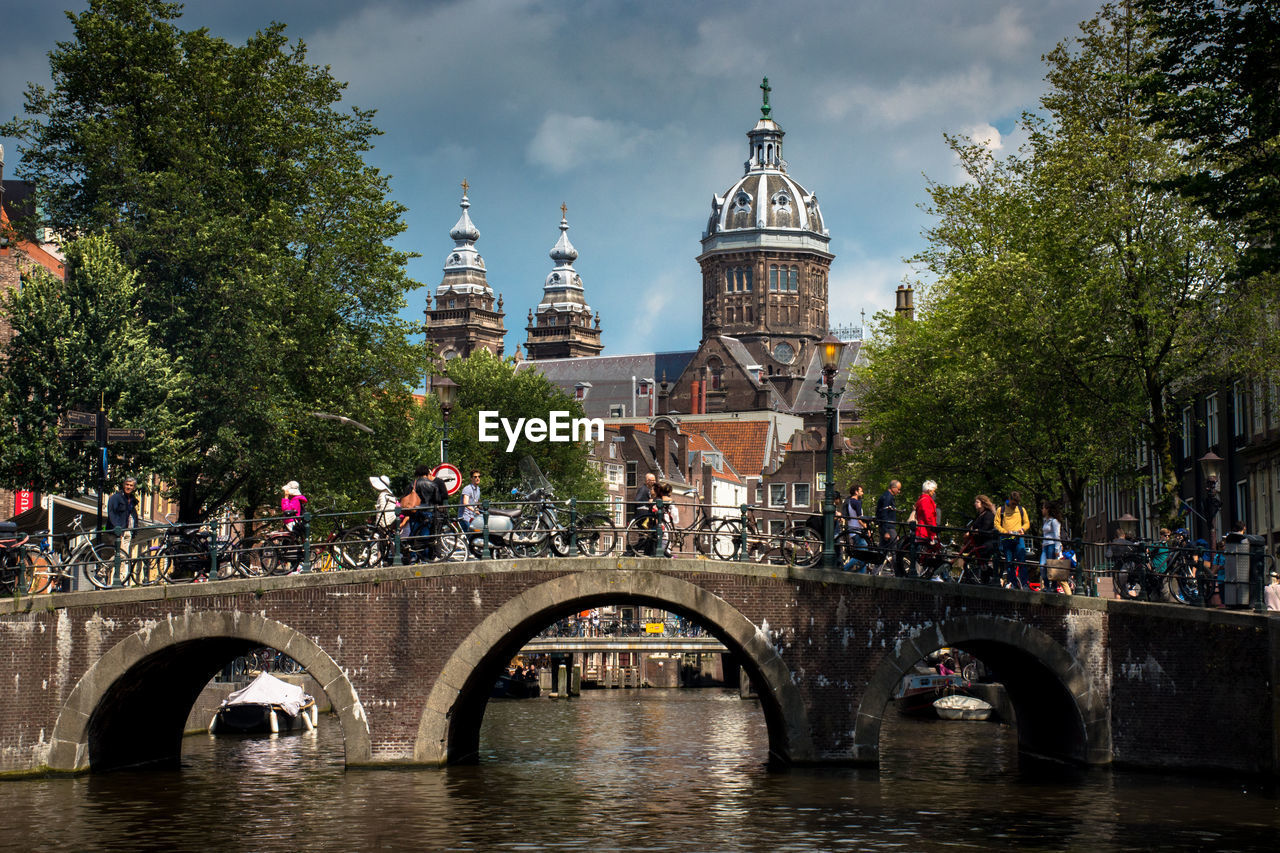 FOOTBRIDGE OVER RIVER IN CITY