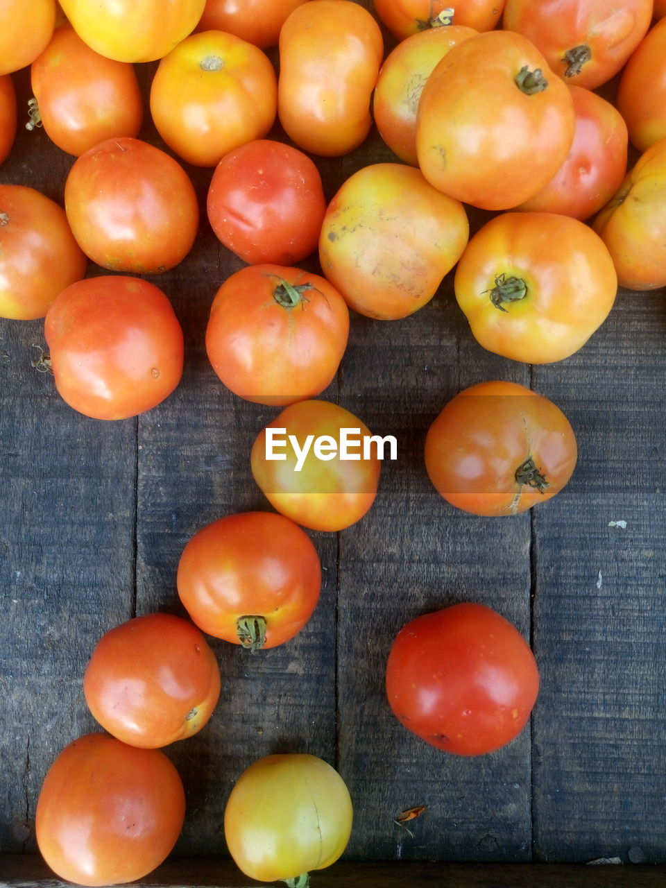 Directly above shot of tomatoes for sale at market stall