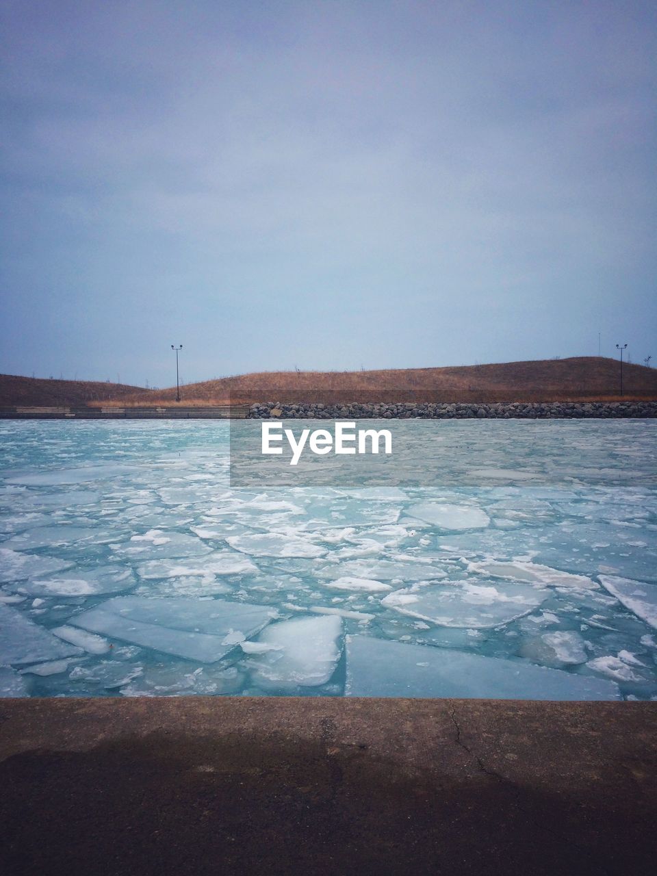 SCENIC VIEW OF LANDSCAPE AGAINST BLUE SKY