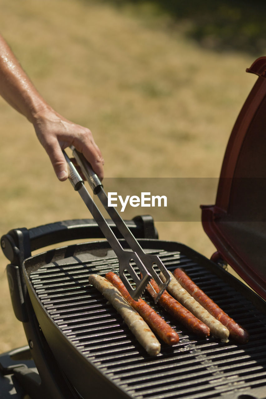 Close-up of meat on barbecue grill