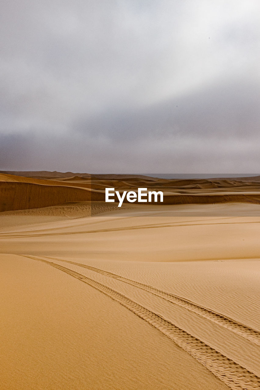 Scenic view of desert against sky