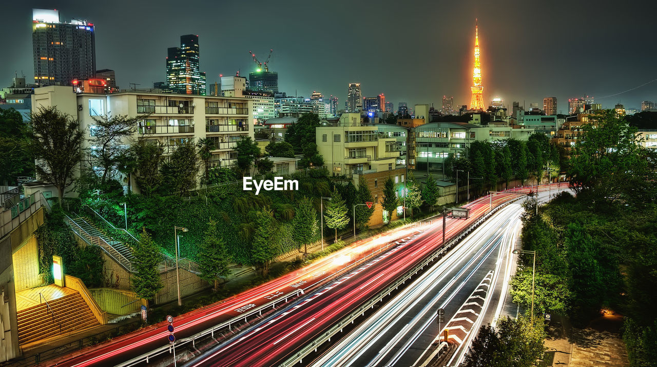 High angle view of light trails on street in city at night